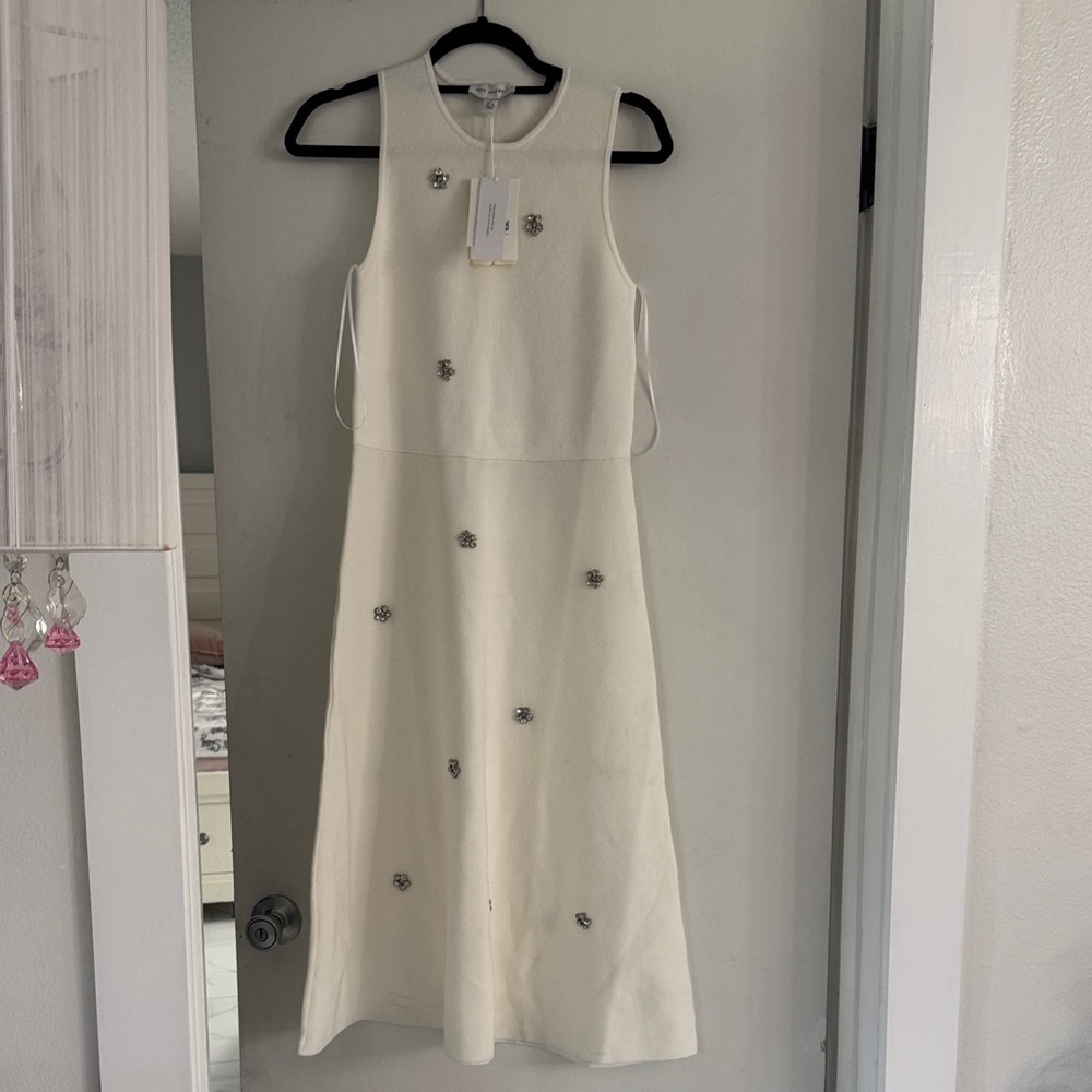 Elegant White Midi Dress with Floral Details